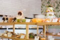 Pastry shop display at wooden shelve, cookies showcase