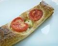 Pastry tart with cheese and tomatoes Royalty Free Stock Photo