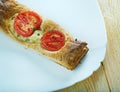 Pastry tart with cheese and tomatoes