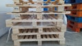 Pasuruan, 9 April 2022 : Stack pallets for industrial and transportation supply chains.  Palettes in the room Royalty Free Stock Photo