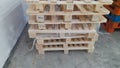 Pasuruan, 9 April 2022 : Stack pallets for industrial and transportation supply chains.  Palettes in the room Royalty Free Stock Photo