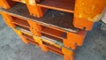 Pasuruan, 9 April 2022 : Stack pallets for industrial and transportation supply chains.  Plastic pallets in the room Royalty Free Stock Photo