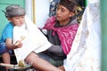 A child who is helping his parents to make batik Royalty Free Stock Photo