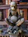 Golden sculpture of a monkey with a durian inside Hiranya Varna Mahavihar. Golden Temple. Patan, Kathmandu. Nepal