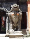 Stone female lion at the entrance gate of Hiranya Varna Mahavihar. Golden temple. Patan, Kathmandu. Nepal