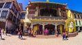 PATAN, NEPAL - April 13, 2018: People going at street in Patan, ancient city in Kathmandu Valley. Royalty Free Stock Photo