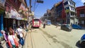 PATAN, NEPAL - April 13, 2018: People going at street in Patan, ancient city in Kathmandu Valley. Royalty Free Stock Photo