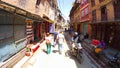 PATAN, NEPAL - April 13, 2018: People going at street in Patan, ancient city in Kathmandu Valley. Royalty Free Stock Photo