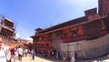 PATAN, NEPAL - April 13, 2018: People going at street in Patan, ancient city in Kathmandu Valley. Royalty Free Stock Photo