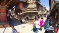 PATAN, NEPAL - April 13, 2018: People going at street in Patan, ancient city in Kathmandu Valley. Royalty Free Stock Photo