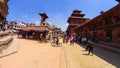 PATAN, NEPAL - April 13, 2018: People going at street in Patan, ancient city in Kathmandu Valley. Royalty Free Stock Photo