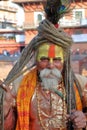 PATAN, NEPAL - DECEMBER 21, 2014: Portrait of a Sadhu Holy man at Durbar Square
