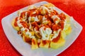 Patatas bravas, potatoes with a hot sauce, popular tapas dish in Spa