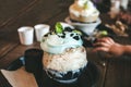 Patbingsu or Korean Shaved ice on wooden table.