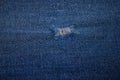 Patch on blue coton background. Jeans Royalty Free Stock Photo