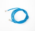 Patch cord network cable with molded RJ45 plug, isolated on a white background Royalty Free Stock Photo