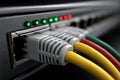 Patch cords connected to network equipment in a well-lit room with indicator lights active Royalty Free Stock Photo