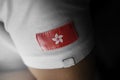 Patch of the national flag of the Hong Kong on a white t-shirt