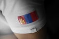 Patch of the national flag of the Mongolia on a white t-shirt