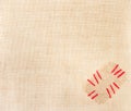 Patch with red stitchs over burlap. Sackcloth Royalty Free Stock Photo