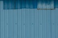 Patched Corrugated Metal Sheet. Royalty Free Stock Photo