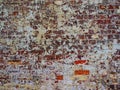 Patched and Flaking Paint on Old Brick Wall Royalty Free Stock Photo