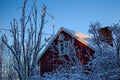 Patches of sunlight on Swedish house in winter Royalty Free Stock Photo