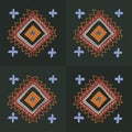 patchwork pattern on dark background