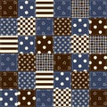 A patchwork quilt in shades of brown and blue. Nine polka dot patterns