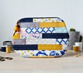 Patchwork quilted makeup bag with wooden beads