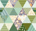 Patchwork seamless pattern with triangle patches. Composition with floral and geometric ornament