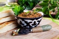 Pate in a cup of Uzbek spatula knife still life parsley