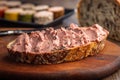 Pate on a slice of bread on wooden table Royalty Free Stock Photo