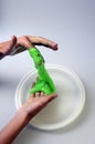 Pate slime elastic and viscous on child`s hand