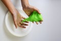 Pate slime elastic and viscous on child`s hand