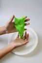 Pate slime elastic and viscous on child`s hand