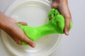 Pate slime elastic and viscous on child`s hand