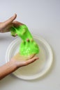 Pate slime elastic and viscous on child`s hand