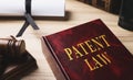 Patent Law book on wooden table, closeup