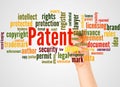 Patent word cloud and hand with marker concept Royalty Free Stock Photo