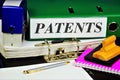 Patents files in folders, a security document certifying the official recognition, exclusive right, authorship and priority of the Royalty Free Stock Photo