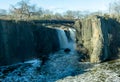 Landscape view of the Great Falls of the Passaic River. A prominent waterfall, 77 feet high, on Royalty Free Stock Photo