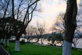 The path along the lake with bare trees. Royalty Free Stock Photo