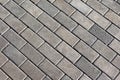 Grey tiles give a harmonic pattern at the ground Royalty Free Stock Photo