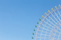 Path of big funfair ferris wheel against clear blue sky Royalty Free Stock Photo