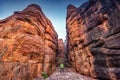 Path through cliffs, Entrance archway for lower and upper Shivalaya in Badami, Karnataka, INDIA Royalty Free Stock Photo