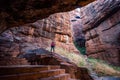 Path through cliffs, Entrance archway for lower and upper Shivalaya in Badami, Karnataka, INDIA Royalty Free Stock Photo