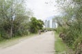 Path of Costanera Sur ecological reserve and modern buildings of Puerto Madero Royalty Free Stock Photo