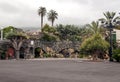 Path in a courtyard with palm trees Royalty Free Stock Photo