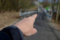 Path for cyclists with an asphalt surface. galvanized iron railing over road barriers. Bridge railing with tilting to the sides. r Royalty Free Stock Photo